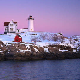  Nubble Light Under A Pastel Winter Sky by Jeff Sinon