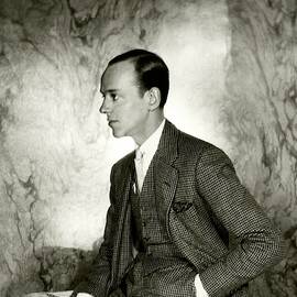A Portrait Of Fred Astaire Sitting by Cecil Beaton