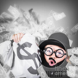 Funny businessman with falling money. Success by Jorgo Photography