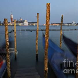 San Giorgio Maggiore church and gondolas at dusk by Sami Sarkis Photography