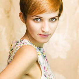 short haired girl in floral dress by Jorgo Photography