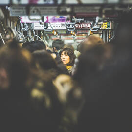 Tokyo Japan Train Woman by Cory Dewald