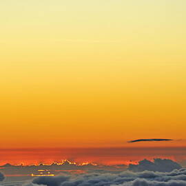 Above cloudscape at sunset by Sami Sarkis Photography