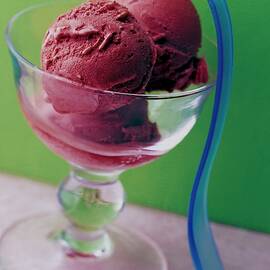 A Berry Sorbet In A Glass Cup by Romulo Yanes