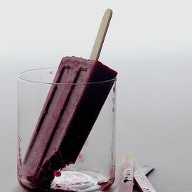 A Blueberry Lime Popsicle by Romulo Yanes