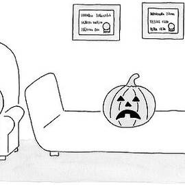 A Carved Pumpkin With A Frowning Face by Karen Sneider