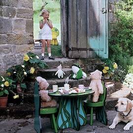 A Dog Sitting Next To Two Teddy Bears Having by Ernst Beadle
