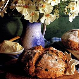 A Gourmet Cover Of Bread And Flowers by Romulo Yanes