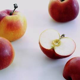 A Group Of Apples by Romulo Yanes