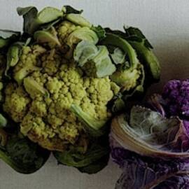 A Group Of Cauliflower Heads by Romulo Yanes