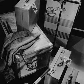 A Group Of Suitcases Ready For Travel by Anton Bruehl