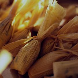 A Group Of Tamalitos by Romulo Yanes