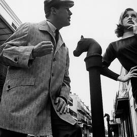 A Male And Female Model Posing On Chartres Street by Chadwick Hall