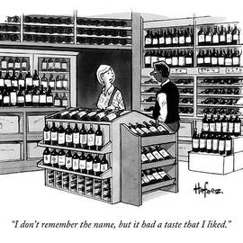 A Man Talking To An Employe At A Wine Store by Kaamran Hafeez