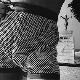 A Man Wearing A Swimsuit by Peter Levy