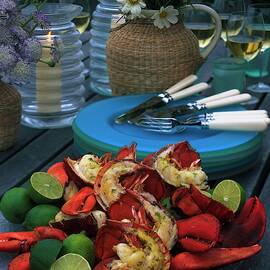 A Meal With Lobster And Limes by Romulo Yanes