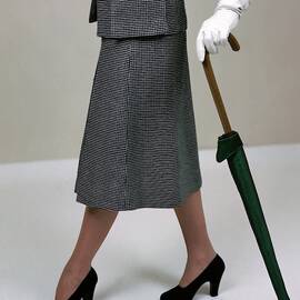 A Model Holding An Umbrella by Serge Balkin