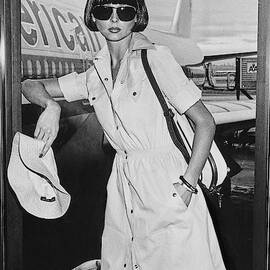 A Model Stands In The American Airlines Lounge by Chris von Wangenheim