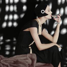 A Model Wearing A Branell Dress by Karen Radkai