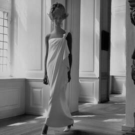 A Model Wearing A Jean Louis Gown by Horst P. Horst