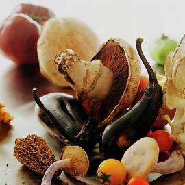 A Pile Of Vegetables by Romulo Yanes