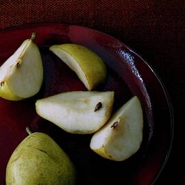 A Plate Of Pears by Romulo Yanes