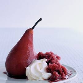 A Poached Pear With Cream by Romulo Yanes