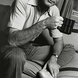 A Portrait Of Johnny Carson Sitting by Bruce Bacon