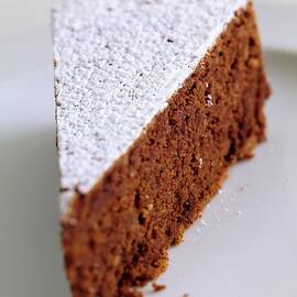 A Slice Of Chocolate Raspberry Ganache Cake by Romulo Yanes