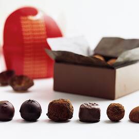 A Still Life Photo Of Gourmet Chocolates by Romulo Yanes