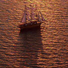 A Three-masted Sailing Ship With Full by Mint Images Art Wolfe