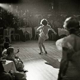A Woman Performing at Nightclub by Remie Lohse