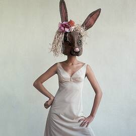 A Woman Wearing A Rabbit Mask by Gianni Penati
