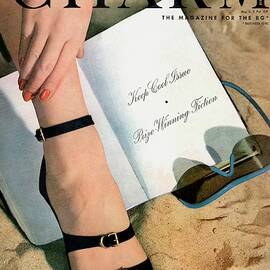 A Womans Foot Wearing Oomphies Sandals by Hal Reiff