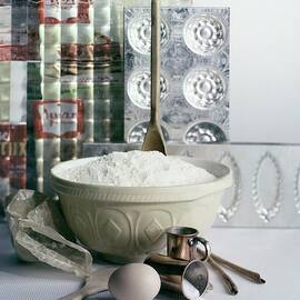 A Wooden Spoon In A Bowl Of Flour by Richard Jeffery