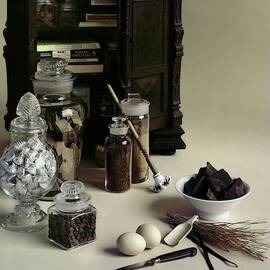 An Assortment Of Chocolate In Glass Jars by Otto Maya