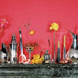 Assorted Silverware On A Mantelpiece by James Wojcik