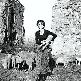 Audrey Hepburn Wearing A Givenchy Ensemble by Henry Clarke