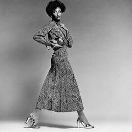 Beverly Johnson Wearing A Chevron Striped Dress by Francesco Scavullo