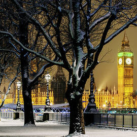Big Ben And Houses Of Parliament In Snow by Shomos Uddin