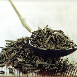 Black Tea Leaves by Romulo Yanes