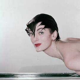 Carmen Dell'orefice Demonstrating Waterproof by John Rawlings