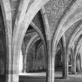 Church archways in black and white by Sue Leonard