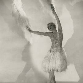 Claire Luce Holding Ostrich Feathers by Edward Steichen