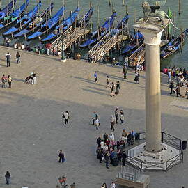 Column of San Marco by gondolas by Sami Sarkis Photography