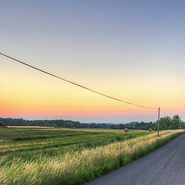 Country Road And Farms At Evening by Matt Champlin