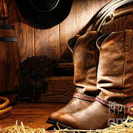 Cowboy Boots in a Ranch Barn by Olivier Le Queinec
