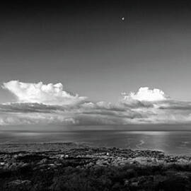 Cumulus Clouds With Moon Over by Alvis Upitis