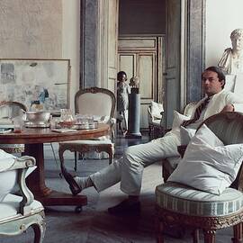 Cy Twombly Sitting In His Apartment by Horst P. Horst