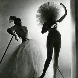Dancers Posing In Costumes From Salvador Dali's by Horst P. Horst